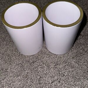 2 white plastic vanity cups!